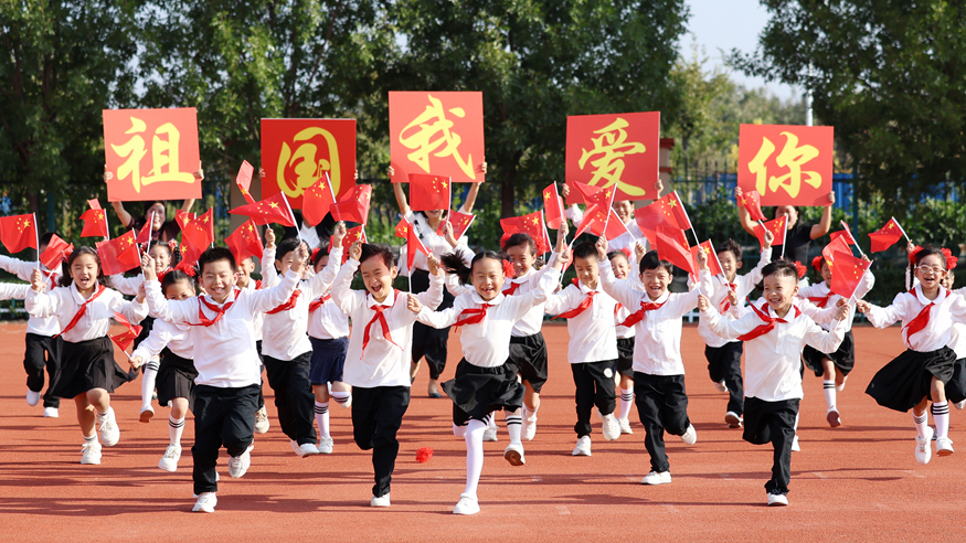 以习近平同志为核心的党中央关心少年儿童成长和少...
