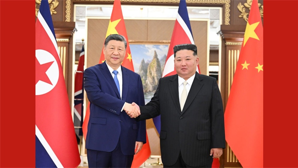 金色相框丨习近平朝鲜之行